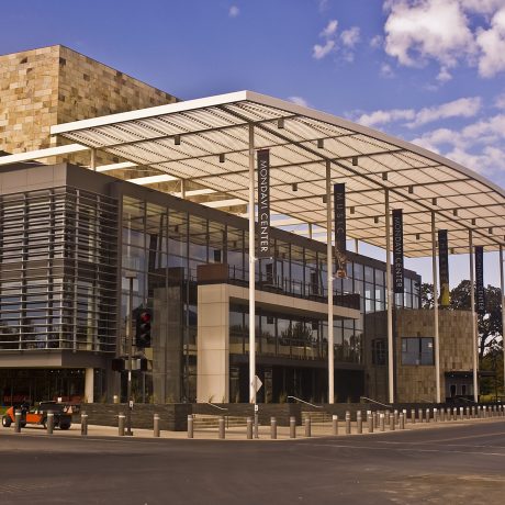 Modern commercial building with curved canopy architecture